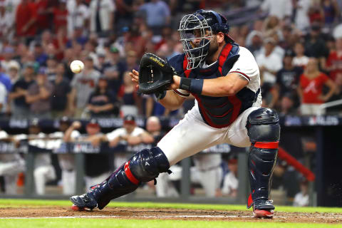 ATLANTA, GEORGIA – OCTOBER 03: Francisco  Cervelli #45 of the Atlanta Braves prepares to tag out Kolten  Wong (not pictured) of the St. Louis Cardinals as he attempts to score a run during the eighth inning in game one of the National League Division Series at SunTrust Park on October 03, 2019 in Atlanta, Georgia. (Photo by Kevin C. Cox/Getty Images)