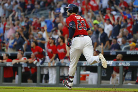 ATLANTA, GEORGIA: Adam Duvall #23 of the Atlanta Braves watches his two-run home run off Jack Flaherty #22 of the St. Louis Cardinals in game two of the NLDS on October 04, 2019. (Photo by Kevin C. Cox/Getty Images)