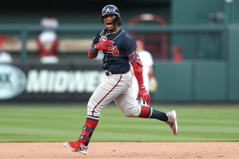 ST LOUIS, MISSOURI – OCTOBER 07: Ronald Acuna Jr. #13 of the Atlanta Braves celebrates after hitting a double against the St. Louis Cardinals during the ninth inning in game four of the National League Division Series at Busch Stadium on October 07, 2019 in St Louis, Missouri. (Photo by Jamie Squire/Getty Images)