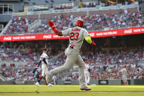 ATLANTA, GEORGIA – OCTOBER 09: Marcell Ozuna #23 of the St. Louis Cardinals scores a run on a double by teammate Tommy Edman (not pictured) against the Atlanta Braves during the first inning in game five of the National League Division Series at SunTrust Park on October 09, 2019 in Atlanta, Georgia. (Photo by Kevin C. Cox/Getty Images)