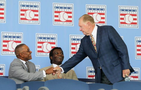 Former Milwaukee Braves second baseman Red Schoendienst shaking hands with friends at the Hall of Fame. (Photo by Jim McIsaac/Getty Images)