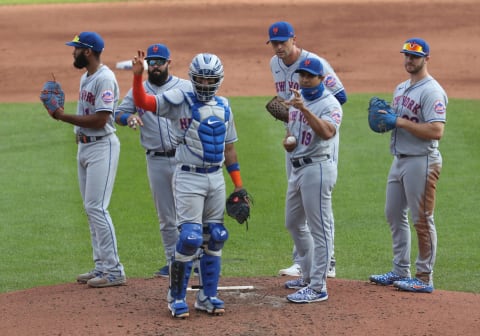 BUFFALO, NY – SEPTEMBER 13: Catcher Robinson Chirinos #26 of the New York Mets and Manager Luis Rojas #19 (Photo by Nicholas T. LoVerde/Getty Images)