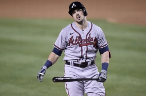 Adam Duvall #14 of the Atlanta Braves reacts after striking out. (Photo by G Fiume/Getty Images)