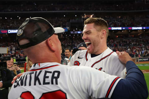 ATLANTA, GEORGIA – OCTOBER 23: Freddie Freeman #5 and manager Brian Snitker #43 of the Atlanta Braves  (Photo by Kevin C. Cox/Getty Images)