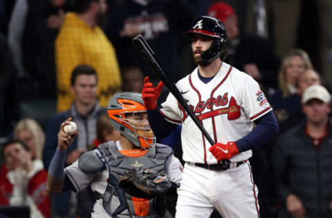 Dansby Swanson #7 of the Atlanta Braves reacts after striking out in Game Five of the World Series. (Photo by Elsa/Getty Images)