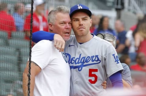 Freddie Freeman hugs Chipper Jones prior to the game on June 25, 2022. (Photo by Todd Kirkland/Getty Images)