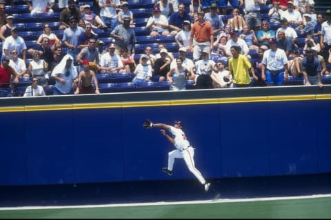 Atlanta Braves outfielder Andruw Jones making another improbably catch. Mandatory Credit: Stephen Dunn /Allsport