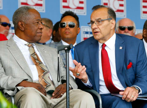 Two former Atlanta Braves Joe Torre (R) and Hall of Famer Hank Aaron talk at Clark Sports Center during the Baseball Hall of Fame induction ceremony.  (Photo by Jim McIsaac/Getty Images)