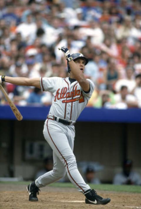 NEW YORK – CIRCA 1990: David Justice #23 of the Atlanta Braves bats against the New York Mets during an Major League Baseball game circa 1990 at Shea Stadium in the Queens borough of New York City. Justice played for the Braves from 1989-96. (Photo by Focus on Sport/Getty Images)