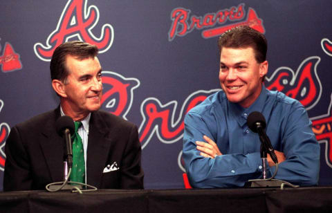 John Schuerholz and Chipper Jones of Atlanta Braves. (Photo credit should read ALAN MOTHNER/AFP via Getty Images)