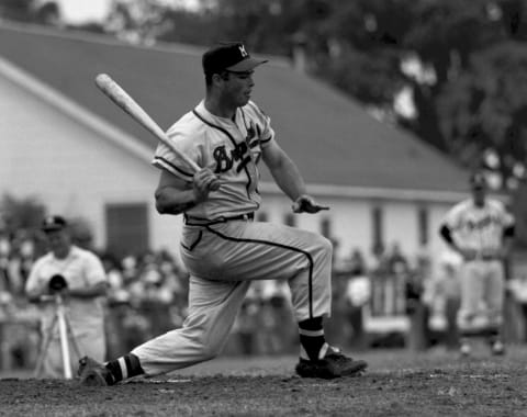 BRADENTON, FL – 1950’s: Third baseman Eddie Mathews #41 of the Milwaukee Braves swings at a pitch during Spring Training in the 1950s at Bradenton, Florida. Mathews played in Milwaukee from 1953-65. (Photo by Kidwiler Collection/Diamond Images/Getty Images)