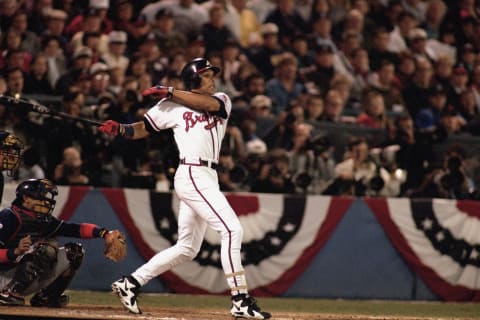 ATLANTA – OCTOBER 22: David  Justice #23 of the Atlanta Braves swings at a pitch during Game two of the 1995 World Series against the Cleveland Indians on October 22, 1995 at Atlanta-Fulton County Stadium in Atlanta, Georgia. The Braves defeated the Indians 4-3. (Photo by Rick Stewart/Getty Images)