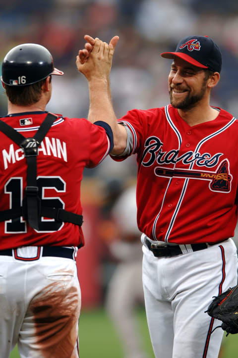 Atlanta Braves catcher Brian McCann has a lot in common with former Braves catcher Del Crandall. (Photo by Scott Cunningham/Getty Images)