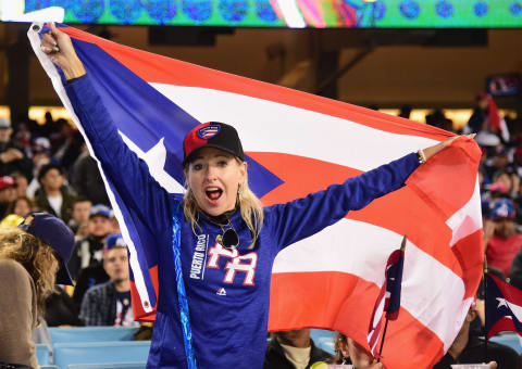 LOS ANGELES, CA – MARCH 22: A fan of team Puerto Rico cheers during the game against team United States during Game 3 of the Championship Round of the 2017 World Baseball Classic at Dodger Stadium on March 22, 2017 in Los Angeles, California. (Photo by Harry How/Getty Images)