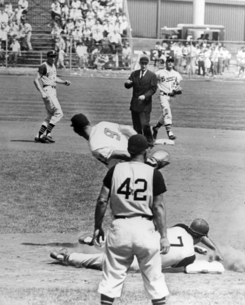 In a former incarnation, The Atlanta Braves were the Milwaukee Braves, and their shortstop was Johnny Logan – top  right in the picture (Photo by Mark Rucker/Transcendental Graphics, Getty Images)