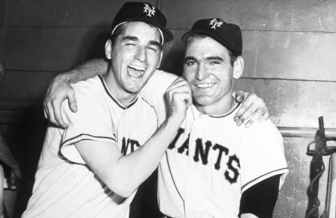 The Atlanta Braves franchise then in Boston, signed baseball’s first bonus baby Johnny Antonelli (left in picture) in 1948. (Photo by Mark Rucker/Transcendental Graphics, Getty Images)