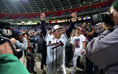 Atlanta Braves outfielder David Justice celebrating after winning the 1995 World Series. (Photo by Ronald C. Modra/Getty Images)