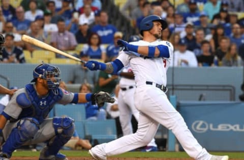 LOS ANGELES, CA – JUNE 27: Yasmani Grandal #9 of the Los Angeles Dodgers hits a two RBI double in the first inning of the game against the Chicago Cubs at Dodger Stadium on June 27, 2018 in Los Angeles, California. (Photo by Jayne Kamin-Oncea/Getty Images)