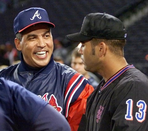 Andres Gallarraga (L) of the Atlanta Braves. (Photo credit STEVE SCHAEFER/AFP via Getty Images)