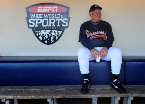 Atlanta Braves manager Bobby Cox sits in the dugout at ESPN Wide World of Sports Complex. (Photo by David Roark/Disney via Getty Images)