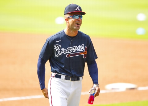 Nick Markakis #22 of the Atlanta Braves having fun on the first day of summer workouts.(Photo by Todd Kirkland/Getty Images)