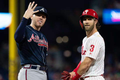 Atlanta Braves first baseman Freddie Freeman and Philadelphia Phillies right fielder Bryce Harper. Mandatory Credit: Bill Streicher-USA TODAY Sports