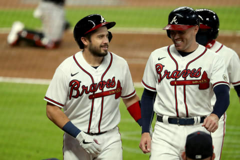 Sep 9, 2020; Atlanta Braves catcher Travis d’Arnaud celebrates a 3-run homer with Freddie Freeman. Mandatory Credit: Jason Getz-USA TODAY Sports