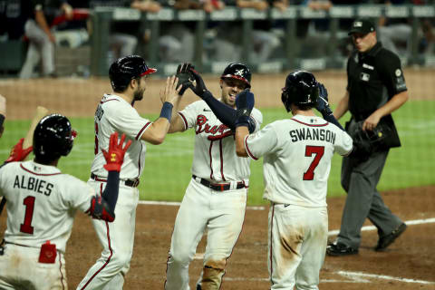 Atlanta Braves outfielder Adam Duvall (23) celebrates his grand slam against the Miami Marlins at Truist Park. Mandatory Credit: Jason Getz-USA TODAY Sports