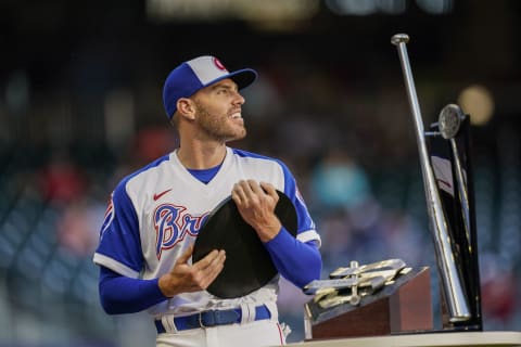 Atlanta Braves first baseman Freddie Freeman reacts upon receiving his Most Valuable Player Award for the 2020 season. Mandatory Credit: Dale Zanine-USA TODAY Sports