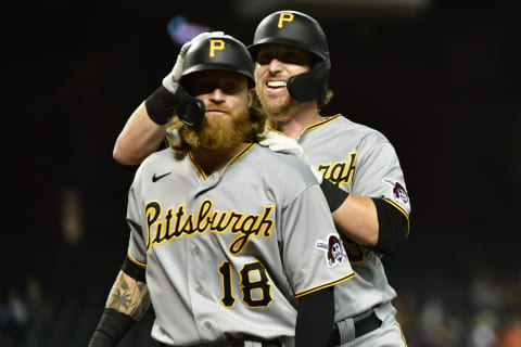 Pirates first baseman John Nogowski celebrates with left fielder and potential Atlanta Braves trade target Ben Gamel (rear). Mandatory Credit: Matt Kartozian-USA TODAY Sports