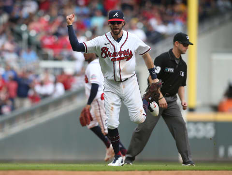 Atlanta Braves shortstop Dansby Swanson (7) reacts after turning a key double play against the Milwaukee Brewers. Mandatory Credit: Brett Davis-USA TODAY Sports