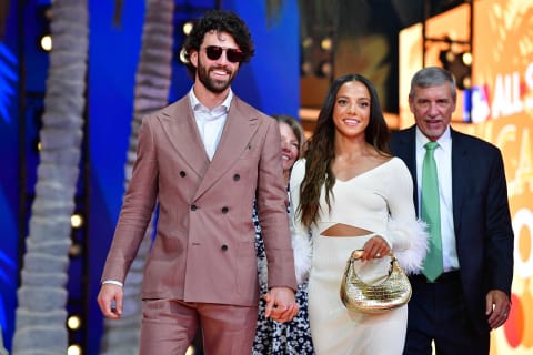 National League shortstop Dansby Swanson (7) of the Atlanta Braves with wife Mallory Pugh during the Red Carpet Show at L.A. Live. Mandatory Credit: Gary A. Vasquez-USA TODAY Sports