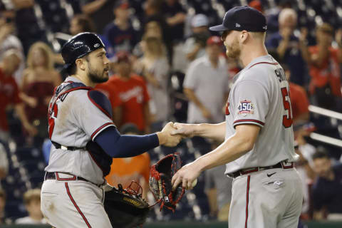 Atlanta Braves catcher Travis d’Arnaud celebrates with Will Smith after Smith recorded a save. Mandatory Credit: Geoff Burke-USA TODAY Sports