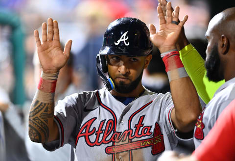 Jul 26, 2022; Philadelphia, Pennsylvania, USA; Atlanta Braves outfielder Eddie Rosario (8) celebrates with teammates after scoring against the Philadelphia Phillies in the ninth inning at Citizens Bank Park. Mandatory Credit: Kyle Ross-USA TODAY Sports