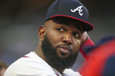 Aug 30, 2022; Atlanta, Georgia, USA; Atlanta Braves left fielder Marcell Ozuna (20) looks on from the dugout against the Colorado Rockies in the second inning at Truist Park. Mandatory Credit: Brett Davis-USA TODAY Sports