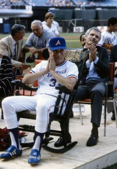 Unknown Date; Atlanta, GA, USA; FILE PHOTO; Atlanta Braves pitcher Phil Niekro (35) at a ceremony with owner Ted Turner at Fulton County Stadium. Mandatory Credit: Manny Rubio-USA TODAY Sports