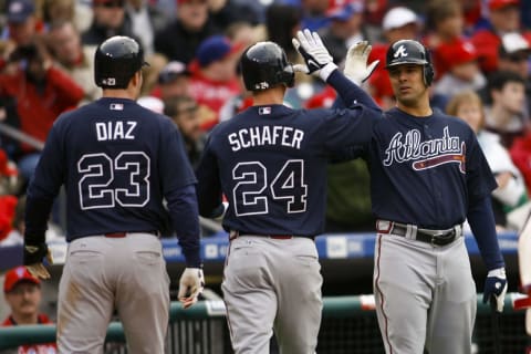 Apr 08, 2008; Philadelphia, PA, USA; Atlanta Braves center fielder Jordan Schafer (24) celebrates hitting a two run home run with pinch hitter Matt Diaz (23) and pitcher Javier Vazquez (33) during the fifth inning against the Philadelphia Phillies at Citizens Bank Park. Mandatory Credit: Howard Smith-USA TODAY Sports