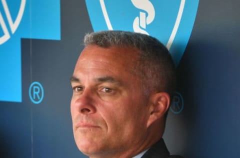 Apr 12, 2017; Kansas City, MO, USA; Kansas City Royals general manager Dayton Moore watches warm ups from the dugout prior to the game against the Oakland Athletics at Kauffman Stadium. Mandatory Credit: Denny Medley-USA TODAY Sports