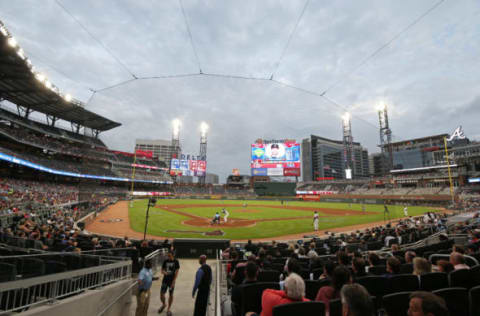 Apr 18, 2017; Atlanta, GA, USA; Atlanta Braves first baseman Freddie Freeman (5) bats against Washington Nationals starting pitcher Max Scherzer (31) in the first inning at SunTrust Park. Mandatory Credit: Jason Getz-USA TODAY Sports