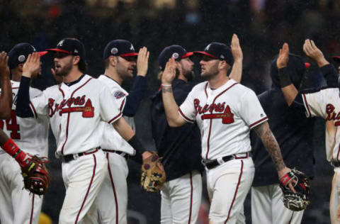 May 22, 2017; Atlanta, GA, USA; Atlanta Braves shortstop Dansby Swanson (7, left) and first baseman Matt Adams (18) celebrate their win against the Pittsburgh Pirates at SunTrust Park. Mandatory Credit: Jason Getz-USA TODAY Sports