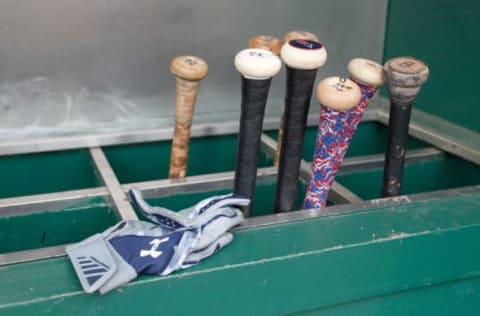 Jun 26, 2015; Pittsburgh, PA, USA; Atlanta Braves batting gloves and bats in the dugout before the Braves play the Pittsburgh Pirates at PNC Park. The Pirates won 3-2 in ten innings. Mandatory Credit: Charles LeClaire-USA TODAY Sports