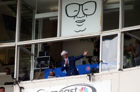 Jul 15, 2016; Chicago, IL, USA; Chicago Cubs former pitcher Ryan Dempster dresses up as Harry Caray while leading the 7th inning stretch of a baseball game against the Texas Rangers at Wrigley Field. Mandatory Credit: Jerry Lai-USA TODAY Sports