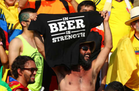 Aug 19, 2016; Rio de Janeiro, Brazil; A fan holds up a shirt about beer in BMX competition in the Rio 2016 Summer Olympic Games at Olympic BMX Centre. Mandatory Credit: Guy Rhodes-USA TODAY Sports