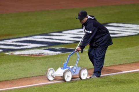 Oct 26, 2016; Cleveland, OH, USA; A member of the grounds crew chalks the base lines before game two of the 2016 World Series between the Chicago Cubs and the Cleveland Indians at Progressive Field. Mandatory Credit: David Richard-USA TODAY Sports