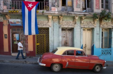 Dec 3, 2016; Santiago de Cuba, Cuba; The ashes of Cuban president Fidel Castro pass through Cespedes Park in Santiago de Cuba where he declared victory on Jan. 1, 1959. Mandatory Credit: Jack Gruber-USA TODAY NETWORK