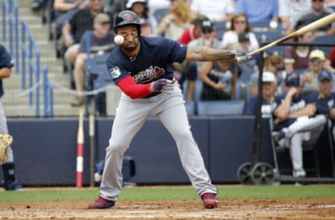 Mar 12, 2017; Tampa, FL, USA;Atlanta Braves left fielder Matt Kemp (27) hit a foul ball off his face during the second inning against the New York Yankees at George M. Steinbrenner Field. But notice the lunged swing.  Mandatory Credit: Kim Klement-USA TODAY Sports