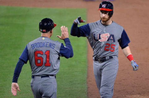 Mar 18, 2017; San Diego, CA, USA; United States catcher Jonathan Lucroy (25) celebrates with United States first base coach Tom Brookens (61) after a single in the third inning against the Dominican Republic during the 2017 World Baseball Classic at Petco Park. Mandatory Credit: Orlando Ramirez-USA TODAY Sports