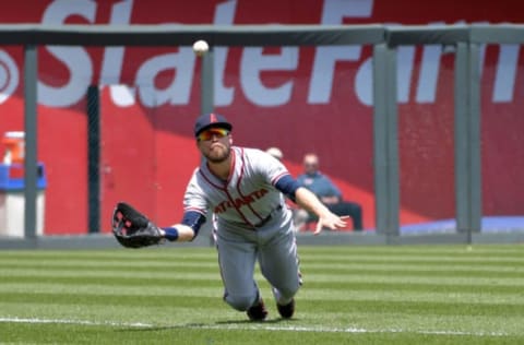 May 15, 2016; Kansas City, MO, USA; Atlanta Braves center fielder Endder Inciarte (11) makes a diving catch on a fly ball in the second inning against the Kansas City Royals at Kauffman Stadium. Mandatory Credit: Denny Medley-USA TODAY Sports