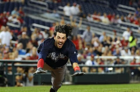 Sep 6, 2016; Washington, DC, USA; Atlanta Braves shortstop Dansby Swanson (2) dives home to score an inside the park home run against the Washington Nationals during the second inning at Nationals Park. Mandatory Credit: Brad Mills-USA TODAY Sports