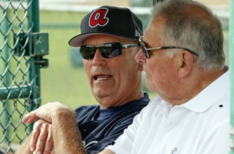 Feb 15, 2017; Lake Buena Vista, FL, USA; Atlanta Braves manager Brian Snitker (left) talks with former manager Bobby Cox during MLB spring training workouts at Champion Stadium. Mandatory Credit: Reinhold Matay-USA TODAY Sports